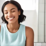 여드름 전용 스킨케어 추천 - A diverse young adult, with clear, healthy, and radiant skin, gently applying a hydrating serum or l...